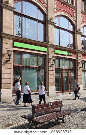 Wroclaw, Poland - September 2, 2018: People Walk By Getin Bank Branch In Wroclaw, Poland. The Bank H