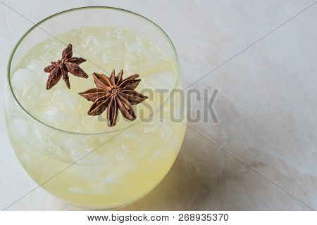 Cardamom Cocktail With Anise Star And Crushed Ice.