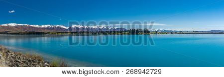 Lake Ruataniwha, New Zealand, South Island, trees and mountains, water reflections
