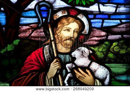 HALIFAX, NOVA SCOTIA, CANADA- AUG 27, 2014: Detail of Jesus the good shepherd from a selection of religious stained glass. Found in St. Paul's Anglican Church, Halifax, NS