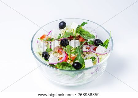 Fresh Vegetable Salad. Salad In Glassware. White Background.
