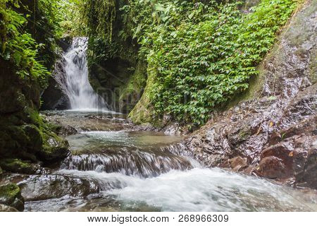 Small Waterfall In Nambillo Cloud Forest Reserve Near Mindo, Ecuador.