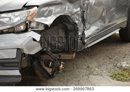 Broken Car After Road Accident, Closeup View. Auto Insurance