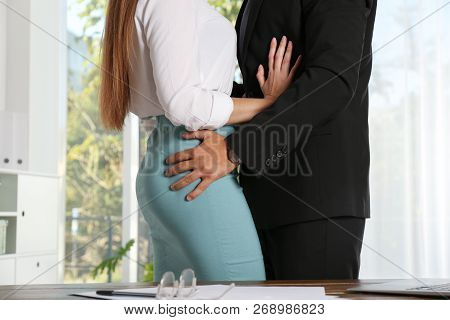 Boss Molesting His Female Secretary In Office. Sexual Harassment At Work