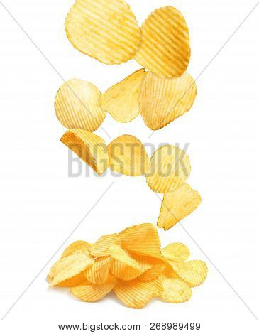 Tasty Potato Chips Falling On White Background