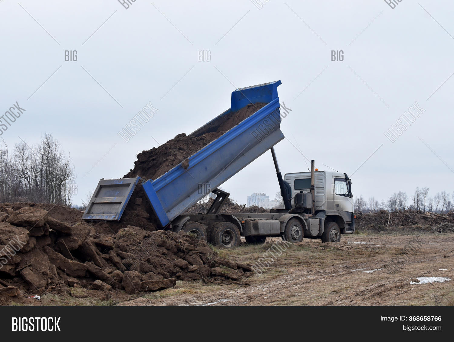 Dump Truck Dumps Load Image & Photo (Free Trial) Bigstock