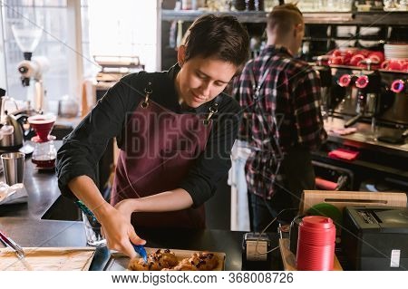 Team Of Two Adult Person Barista And Baker Different Sex Colleague Work Together As Team In Local Mo