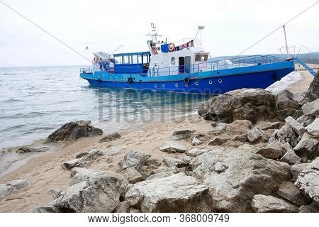 OLKHON ISLAND, 27 AUGUST, 2019: Tourists traveling on Olkhon Island, Baikal Lake, Siberia, Russia