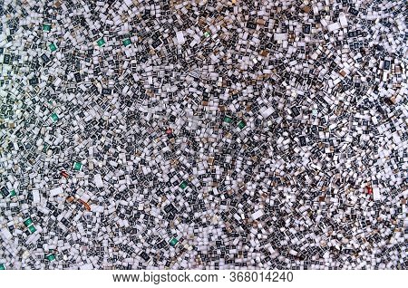 Electronic Components In Bulk. Texture Of Chip Resistors