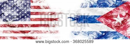 American Flag And Cuban Flag In Smoke Shape On White Background. Concept Of World Conflict And War. 