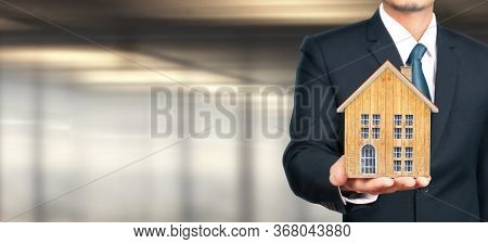 House Residential Structure In Hand.  Concept Of Investment Propert And Finance Investment Concep