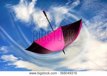 Surreal Pink Umbrella Flying Fast And Away.