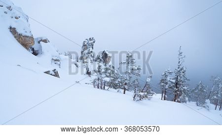 Snow-capped Peaks Of Taganai National Park Located In The South Urals In Russia.