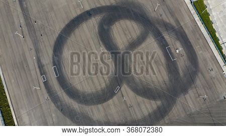 Texture Of Asphalt Surface. Tire Marks, Tire Tread, Tread Marks. Sport. Street Race. Rally, Highway,