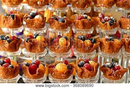 Brandy Snap Cookies With Fresh Berries For Display