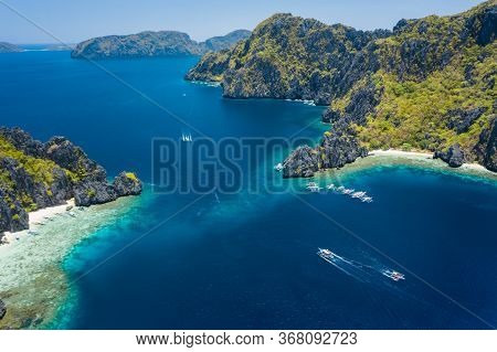 Aerial Drone View Of Strait Between Miniloc And Shimizu Tropical Islands. El Nido, Palawan, Philippi