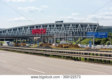 Huge Bosch Letters At The Stuttgart Airport Parking Garage With Empty Highway A8 And Construction Wo