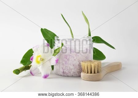 Transparent Plastic Jar With Large Flakes Of Violet Lavender Sea Salt And Natural Wood Cleansing Pee