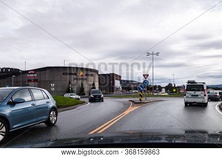 Editorial 09.06.2019 Knarvik Norway Driving Through Knarvik With The Shopping Mall On The Left Side