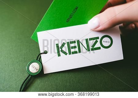Kenzo Logotype On Green Background , Kenzo Is Fashion Clothing Store.