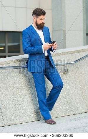 I Can Not Imagine Life Without Smartphone. Text Messaging. Online Business. Bearded Man With Smartph