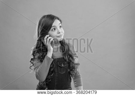 Conversation Concept. Little Girl Having Phone Talk. Modern Life Communication. Kid Shopping Online.