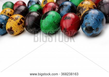 Frame Of Multi-colored Quail Eggs. Multi-colored Quail Easter Eggs On A White Background. Multi-colo