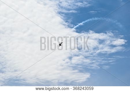 Low Angle View Of Airplane Against Cloudy Sky Looping, Military Fighter Jets Flypass, Sport Aircraft