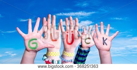 Children Hands Building Word Glueck Means Luck, Blue Sky