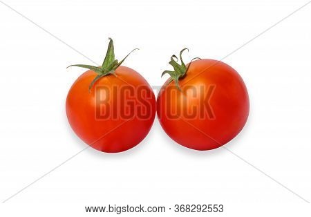Two Red Tomatoes Isolated On The White Background. Cherry Tomato Is A Small That Has A Sweet, Firm T