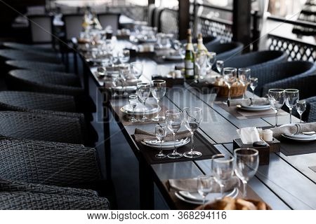 Festive Table Setting With Empty Wine Glasses