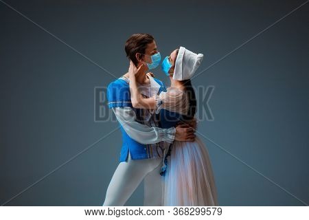 Modern Cinderella Not Trying The Slipper On, But Kissing With Protective Face Mask. Young And Gracef