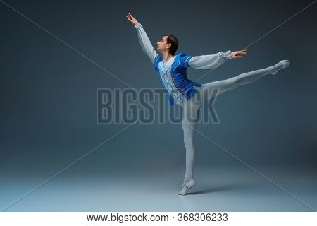 Young And Graceful Ballet Dancer As Cindrellas Prince On White Studio Background. Art, Motion, Actio