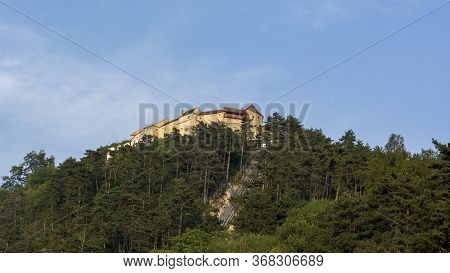 Rasnov Fortress (cetatea Râșnov) At The Top Of The Hill. Brasov County, Romania