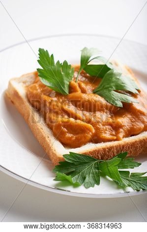 Healthy Toast With Zucchini Caviar. Russian Traditional Sandwich Served In A Plate With Herbs On A W