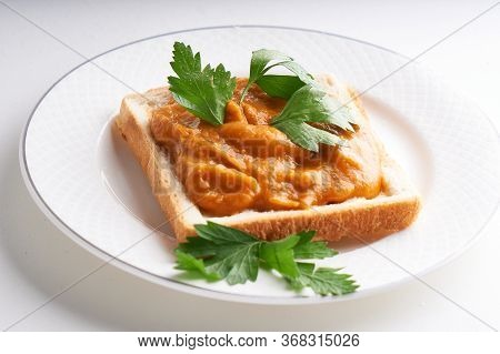 Healthy Toast With Zucchini Caviar. Russian Traditional Sandwich Served In A Plate With Herbs On A W