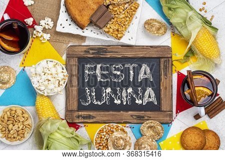 Brazilian Festa Junina Party. Table With Traditional Food, Sweets And Drinks For Festa Junina Celebr