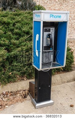 Pay Phone On A Sidewalk