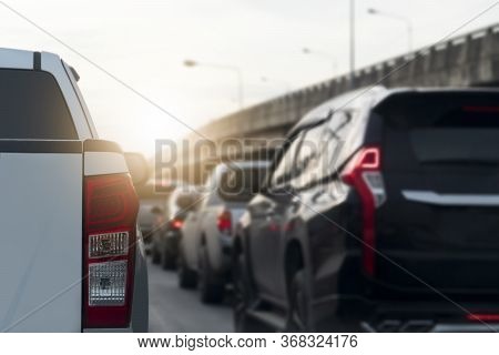 Luxury Rear Corner Of Pickup Silver Bronze Car On The Road With Open Brake Light.  Traffic Congestio
