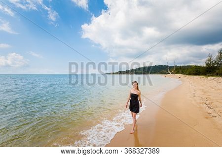 Woman In Black Dress On Cua Can Beach Phu Quoc