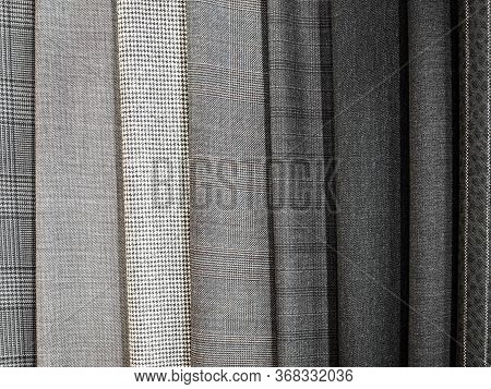 Monochrome Collection Of Fabrics In A Cage Close-up, A Fashion Trend. Samples Of Checkered Fabric In