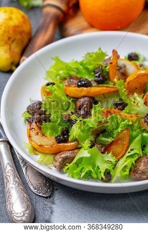 Salad With Fried Chicken Liver And Pears.