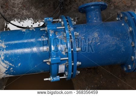 Blue Pipe (tube). Fluid Conveyance. Pipeline. Coupling With Bolts.