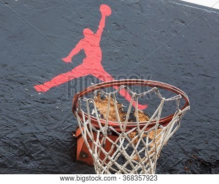 Kyiv, Ukraine -  April 21, 2016: Jumpman Logo By Nike Painted On The Black Backboard Of The Old Bask