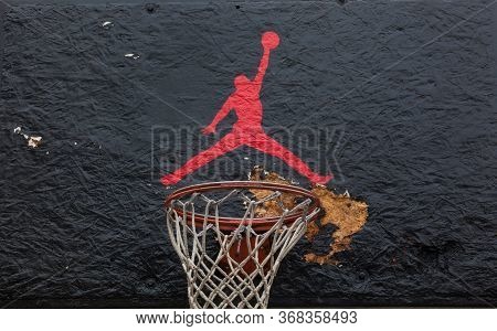 Kyiv, Ukraine -  April 21, 2016: Jumpman Logo By Nike Painted On The Black Backboard Of The Old Bask