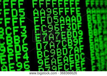 Computer Code On The Screen. Programming Language. Green Numbers And Letters. Computer Science.