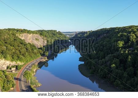 Avon River In The Gorge In Bristol With Reflection Of The Brunel Suspension Bridge. Uk