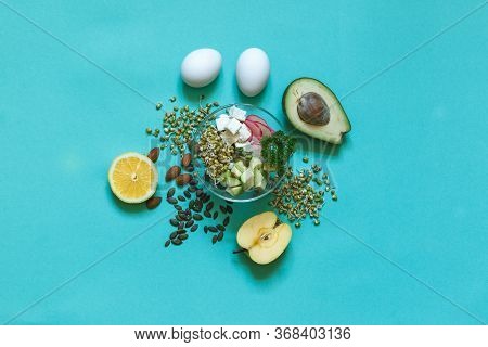 Set For A Healthy Balanced Snack With Munga Bean Sprouts, Avocado And Tofu On An Aquamarine Backgrou