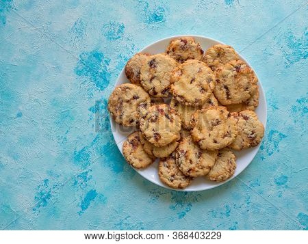 Date Cookies. Arabic Sweets On The Blue Surface. Top View, Copy Space.