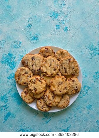 Date Cookies. Arabic Sweets On The Blue Surface. Top View, Copy Space.
